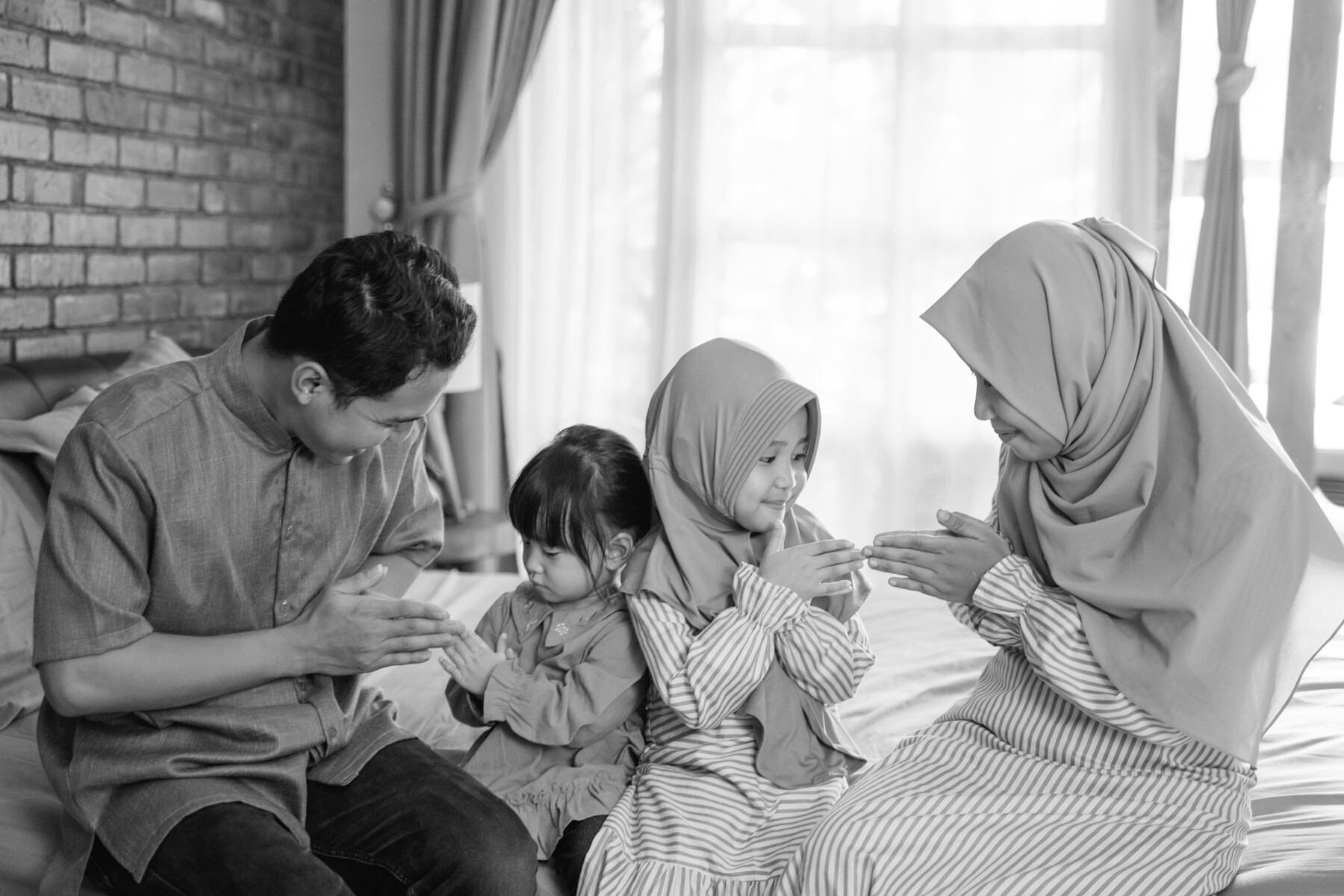 Asian Muslim Families Greeting Each Other